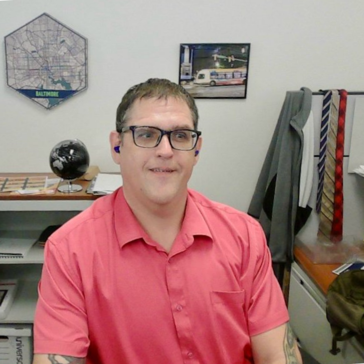 An image of Jake Schutt at his desk at the Baltimore Metropolitian Council